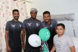 لاعبي هجر يشاركون الأطفال المرضى فرحة اليوم الوطني
